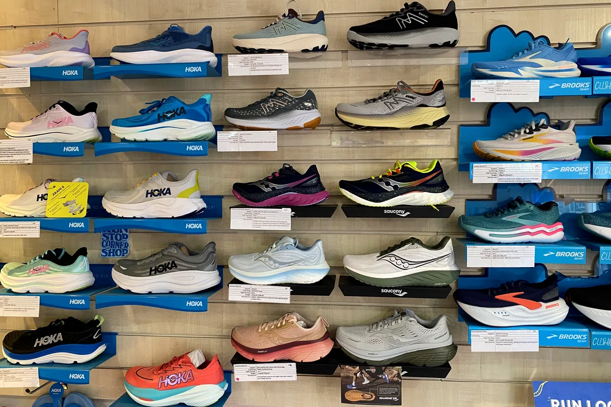 Road running shoes on the Yorkshire Runner shop wall